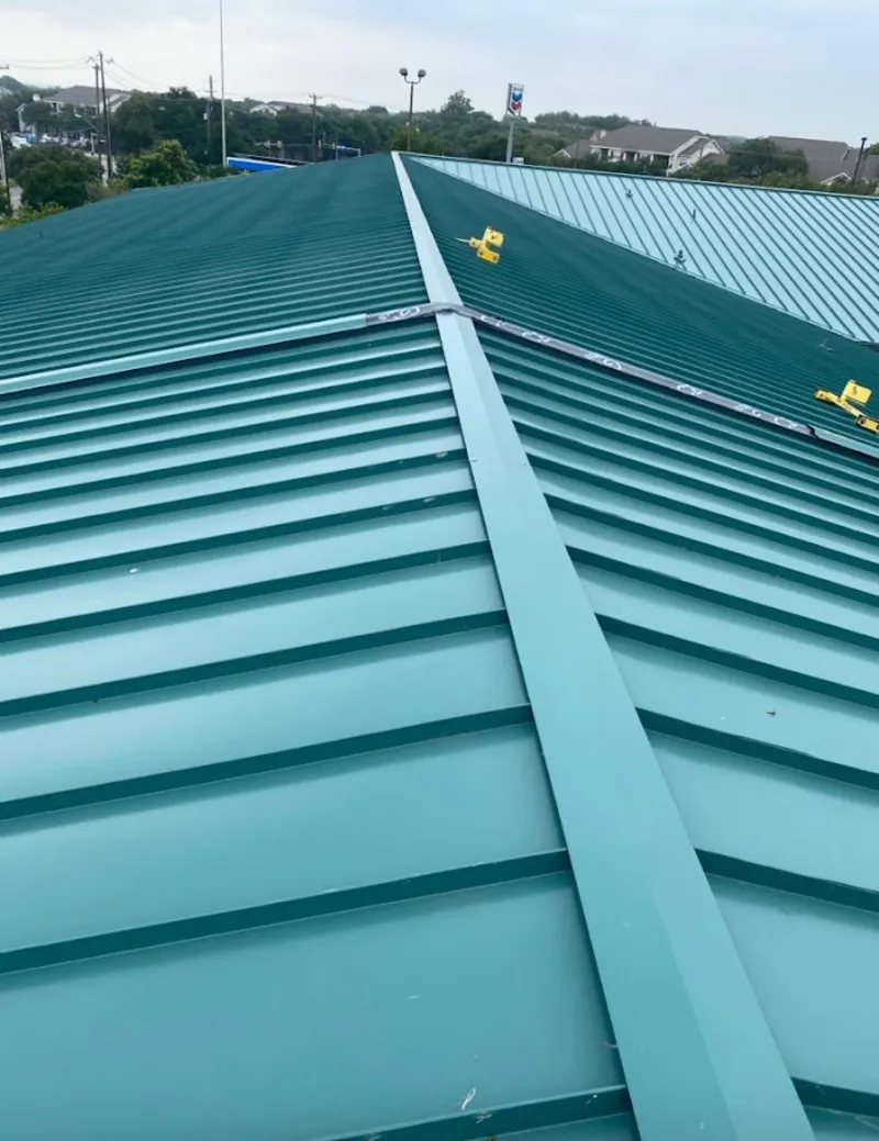 Green commercial metal roof ridge and valley for Metal Roof Repair in Raymore